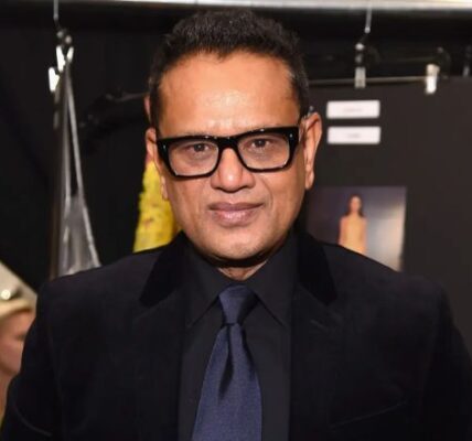 Naeem Khan, the renowned fashion designer, showcasing his latest collection at New York Fashion Week.