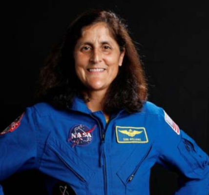 Astronaut Sunita Williams conducting a spacewalk outside the International Space Station.