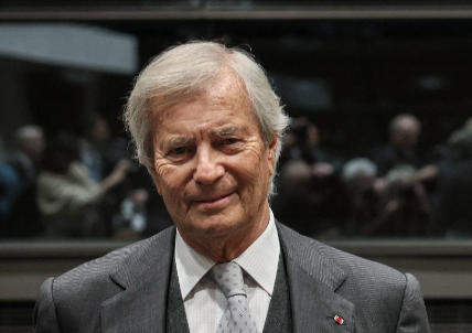 Vincent Bolloré, a billionaire businessman, transformed the Bolloré Group into a global giant in media and logistics, navigating controversies and political ties throughout his career.