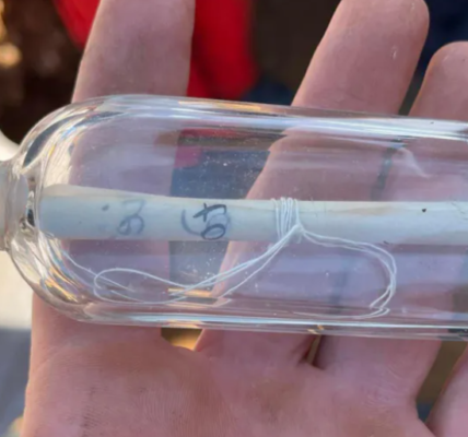 A group of student volunteers excavates an ancient Gaulish village near Dieppe, France, where they discovered a 200-year-old message inside a glass flask. The note, from P.J. Féret, details his past excavations in the area, highlighting the site's historical significance. The team, led by Guillaume Blondel, is investigating the remnants of the settlement amid concerns of erosion.