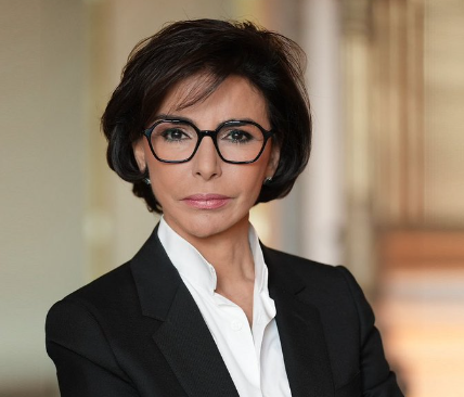 Portrait of Rachida Dati, a prominent French politician and Minister of Culture, showcasing her journey from a judicial career to leading cultural initiatives in France.