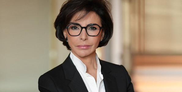 Portrait of Rachida Dati, a prominent French politician and Minister of Culture, showcasing her journey from a judicial career to leading cultural initiatives in France.