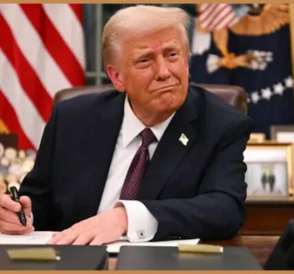 Donald Trump addressing an audience with an animated expression.