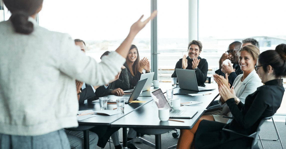 Leader delegating tasks to team in a modern workplace