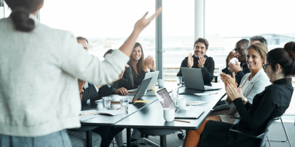 Leader delegating tasks to team in a modern workplace