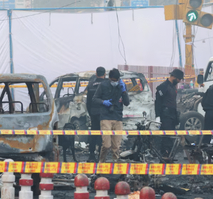 Police investigate the wreckage after a deadly car explosion near Delhi’s Red Fort.