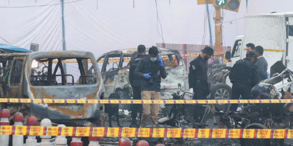 Police investigate the wreckage after a deadly car explosion near Delhi’s Red Fort.