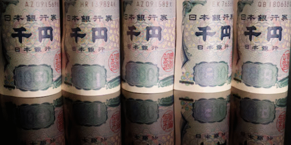 Japanese yen banknotes displayed amid currency market volatility.