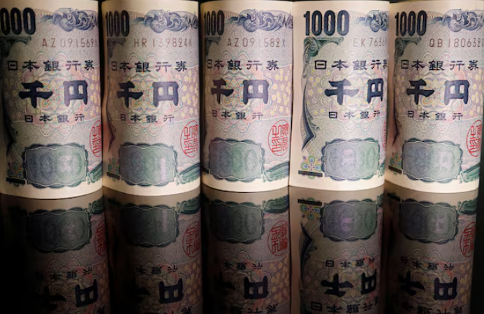 Japanese yen banknotes displayed amid currency market volatility.