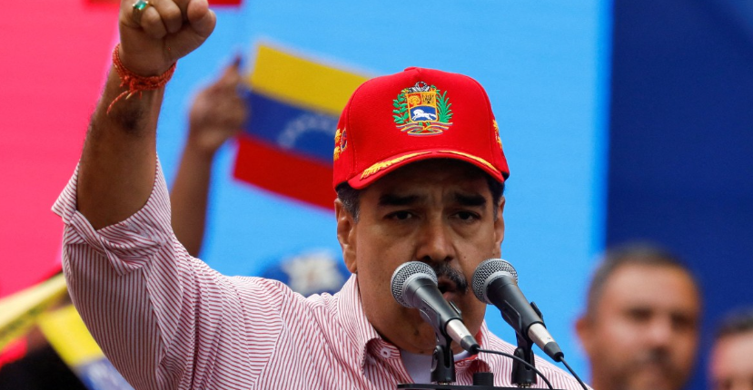 Maduro addresses supporters as US pressure on his government intensifies.