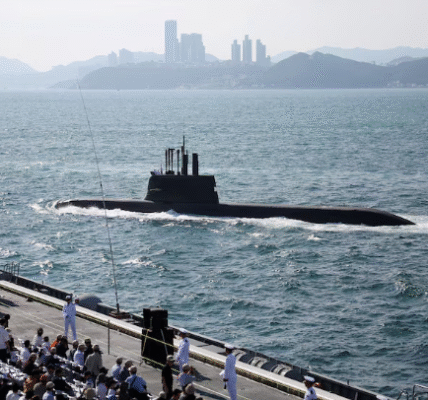 South Korean submarine crew salutes during Navy’s 80th anniversary review