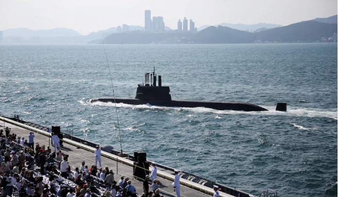 South Korean submarine crew salutes during Navy’s 80th anniversary review