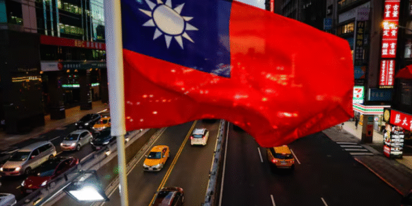 A Taiwan flag hangs above a Taipei overpass as the city prepares for National Day.