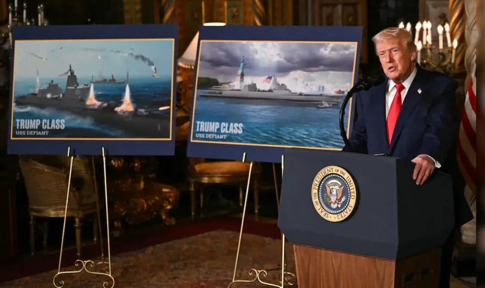 U.S. President Donald Trump walks past a rendering of the Trump-class warship USS Defiant at Mar-a-Lago in Palm Beach, Florida.