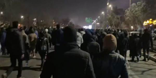 Protesters in Mashhad chant slogans in support of the former monarchy during anti-government demonstrations.