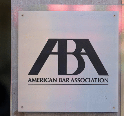 Signage stands outside the headquarters of the American Bar Association in Washington.