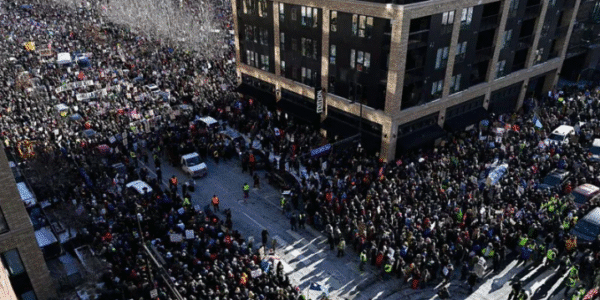 Thousands gather in downtown Minneapolis for a mass protest against federal immigration enforcement