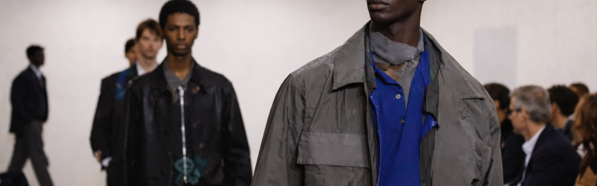 Models present looks from the Men’s Fall/Winter 2026 collection during the Paul Smith show at Milan Men’s Fashion Week.