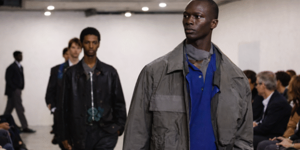 Models present looks from the Men’s Fall/Winter 2026 collection during the Paul Smith show at Milan Men’s Fashion Week.