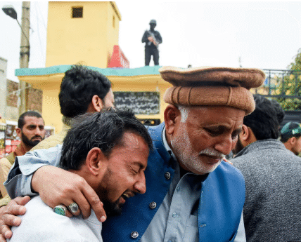 Mourners gather for the funeral of victims killed in a suicide attack at a Shi’ite Muslim mosque.