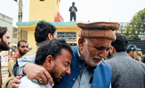 Mourners gather for the funeral of victims killed in a suicide attack at a Shi’ite Muslim mosque.