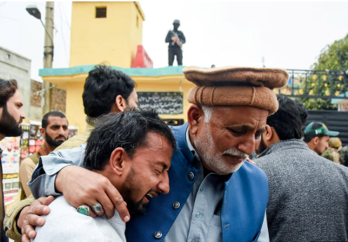 Mourners gather for the funeral of victims killed in a suicide attack at a Shi’ite Muslim mosque.